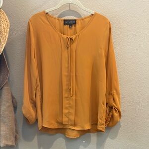 Sweet Wanderer Orange Blouse with Tie Neck and 3/4 Button Tab Sleeves